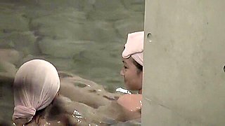 Naked Asian girlie is bathing in the sauna pool on nri110 00