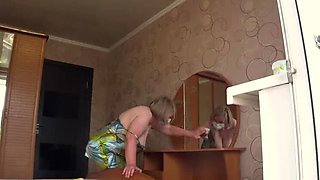 Neighbor Spies On Busty Mature Housewife Through Open Window