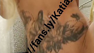 Katia Star skinny fit fake tits blonde bimbo plays with her pussy in the bathroom and cums on dildo