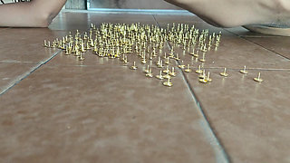 Masochistic Slave Having an Orgasm While Lying on Thumbtacks