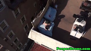 Drone films rooftop sex
