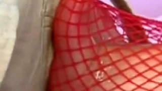 Blonde babe wearing fishnets gets cum on feet