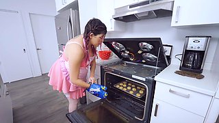 Pigtailed pregnant teen gives perfect blowjob in the kitchen