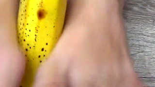 Babe with nice legs, crush a banana with her feet, perfect footjob ending