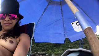 First-time Nudist Hesitates to Undress on Beach
