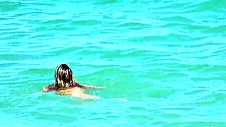 Shameless amateur fisted on a public beach