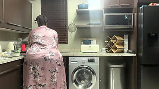 Ebony MILF Moaning and Stripteasing in Kitchen
