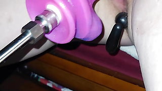 Milf makes a mess of her pussy with a dildo machine fuck and anal beads