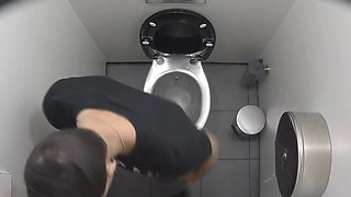 Three boys secretly filmed in a public toilet