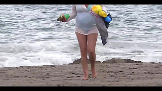 My Wife, a Beautiful 58-year-old on the Beach, Shows off and Masturbates with Hers