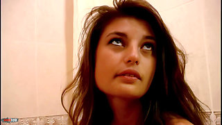 Carla: Great Little Brunette with Big Tits Carla Doing a Hot Striptease on the Bed