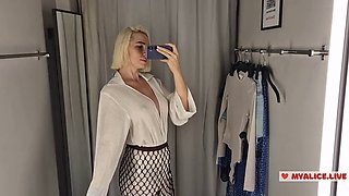 Trying on transparent clothes with huge tits in the fitting room. Completely transparent clothes