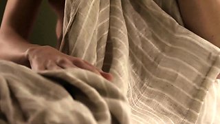 Skinny blonde Italian MILF strips naked
