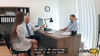 Mina K trades sex for a loan in the office with her tattooed babe friend