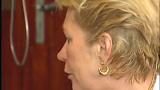 Horny granny spreads legs in the air as she gets fucked in the office