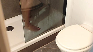 Filming my milf wife in the shower with huge naturals tits