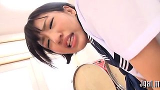 Japanese beauty in a school uniform experiences sexy banging