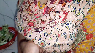 Desi Bhabhi fucked while cutting vegetables in the kitchen