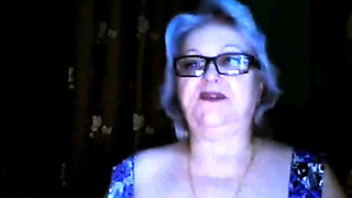 Russian granny ex-teacher flashing her big tits on  webcam