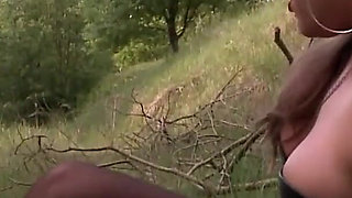 Herrin enslaves man and enjoys foot fetish outdoor