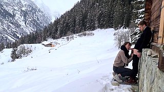 Couple enjoys hidden passionate lovemaking during winter mountain trip