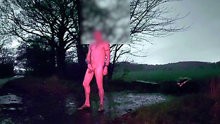 Wanking naked in the rain