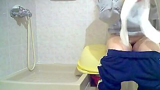 Voyeur shots of a lovely ass pissing on a toilet