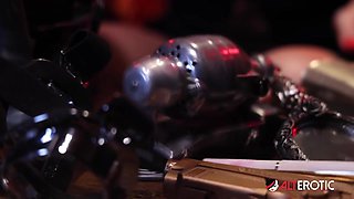 Kitt Jones gets so horny in her bunker she uses a powerful machine on her pussy! - AltErotic