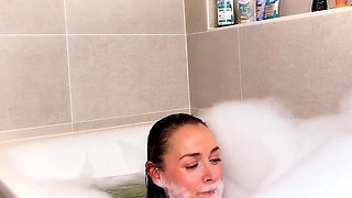 Teen Sexy Lexxy having dildo sex in the bathtub