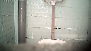 Redhead white stranger lady in the toilet room pissing in front of hidden cam