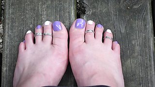 Purple and White Toes Wiggling Wearing Toe Rings