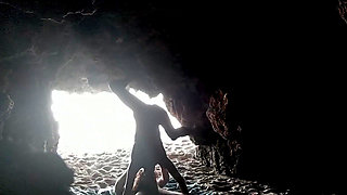 Couple recorded at the beach, inside the cave