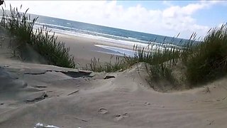 Exhibitionist Strokes Hard on the Beach
