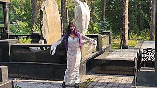 Gothic Witch Wanders the Cemetery, Performs Black Magic Rituals, and Makes You to Worship Her and Satan.