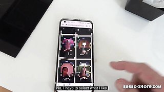 Bald mature man scrolls Italian dating site sesso-24ore.com on smartphone over stove
