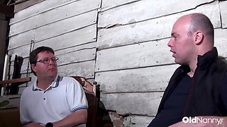 Busty Mature Trisha Handles Two Eager Studs