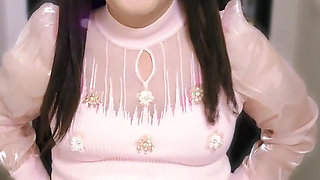 Dressed in a Cute, Feminine Outfit, She Masturbates While Standing up