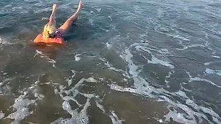 Try Not to Wet My Hair While Play with the Waves