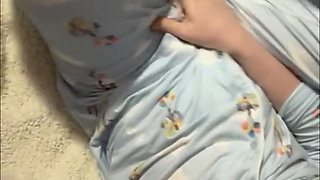 Cute girl desperate to pee in bed squirts piss all over her dildo