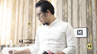 Hair-bun Asian kneels and sucks