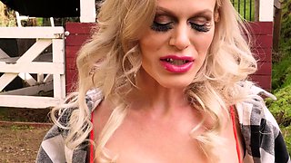 Blonde is flashing her big boobs in the outdoors