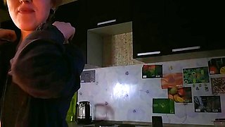 Blonde Teases Tits in Kitchen