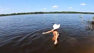 Blonde Solo Nudist Shows Off Tattoos by the River