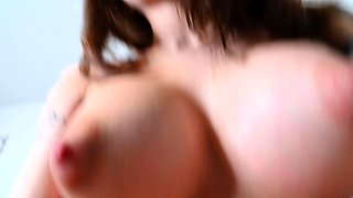 Busty curly brunette with big boobs fucks on couch