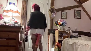 In an outfit with a short, slit skirt for an evening