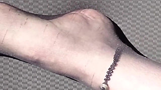 Feet of Nylonjunge in Pantyhose in Car