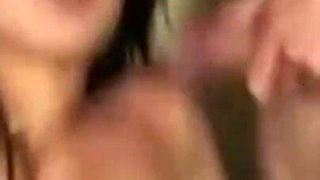 Mature Brunette Devours Two Throbbing Cocks in Sloppy Threesome