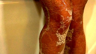 Hot babe with perfect big boobs taking shower