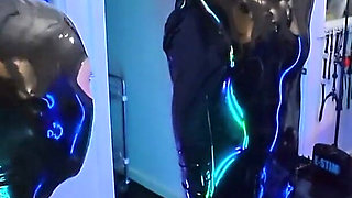 Bts: Neon-lit Alien Latex Lab - Standing Fisting in a Latex Sack