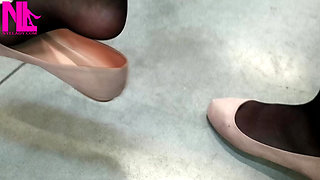 Dangling in Rose Ballet Flats in a Store
